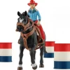 Barrel racing med cowgirl
