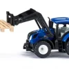 New Holland med pallegaffel og palle