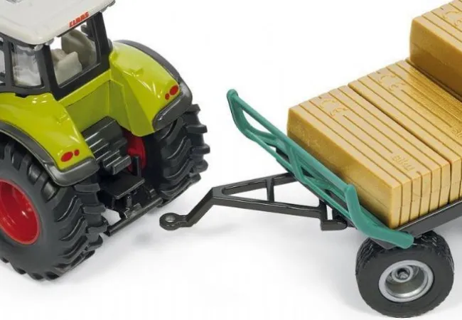 Traktor med balle griber 1:50